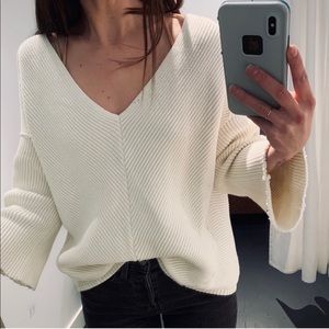 Free people sweater with raw hem